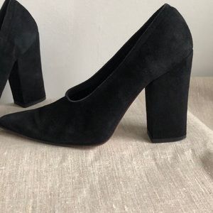 Black suede pumps by Omari Shoes NY